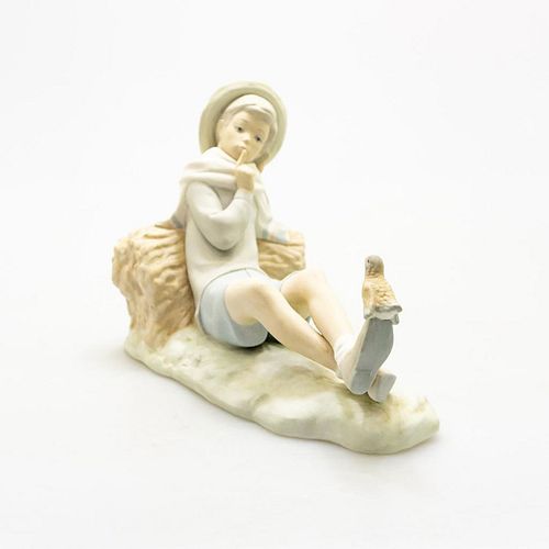 LLADRO FIGURINE, RECLINING BOY WITH