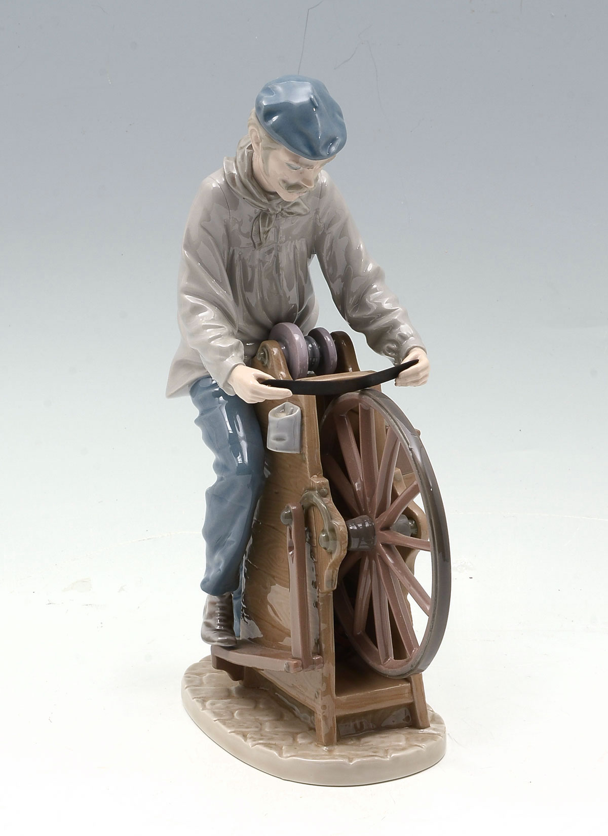 LLADRO FIGURINE ''SHARPENING THE
