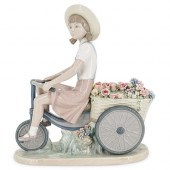 LLADRO “GIRL WITH FLOWERS IN T