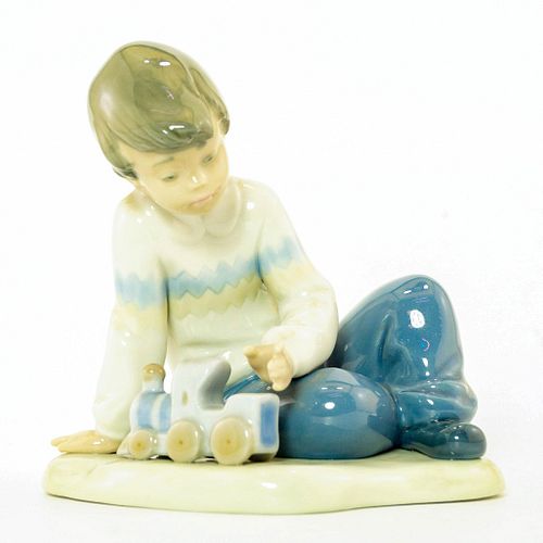 LLADRO NAO FIGURINE, BOY WITH TOY