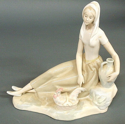Lladro type figure of a seated
