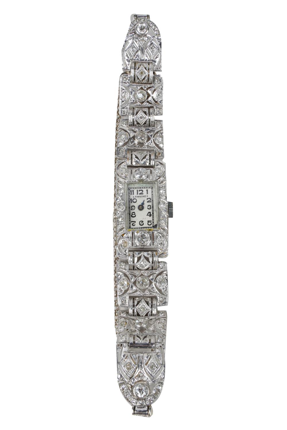 LONGINES 14 KARAT WHITE GOLD,