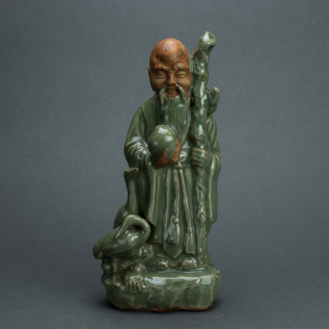 LONGQUAN CELADON GLAZED FIGURE OF