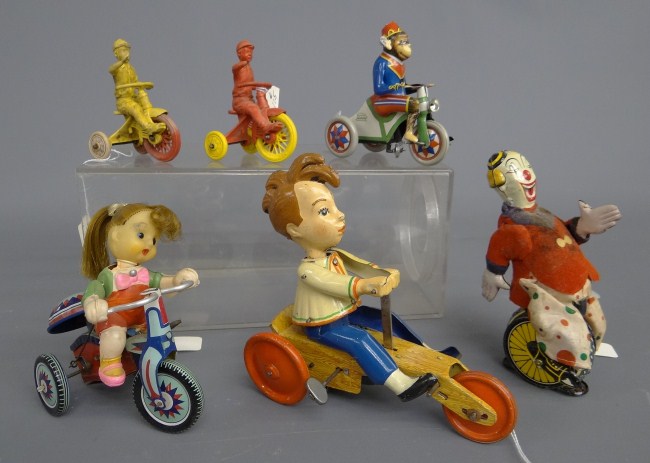 Lot 6 various vintage bicycle toys.