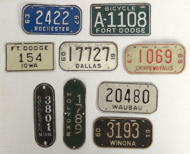 Lot: (9) bicycle license plates /