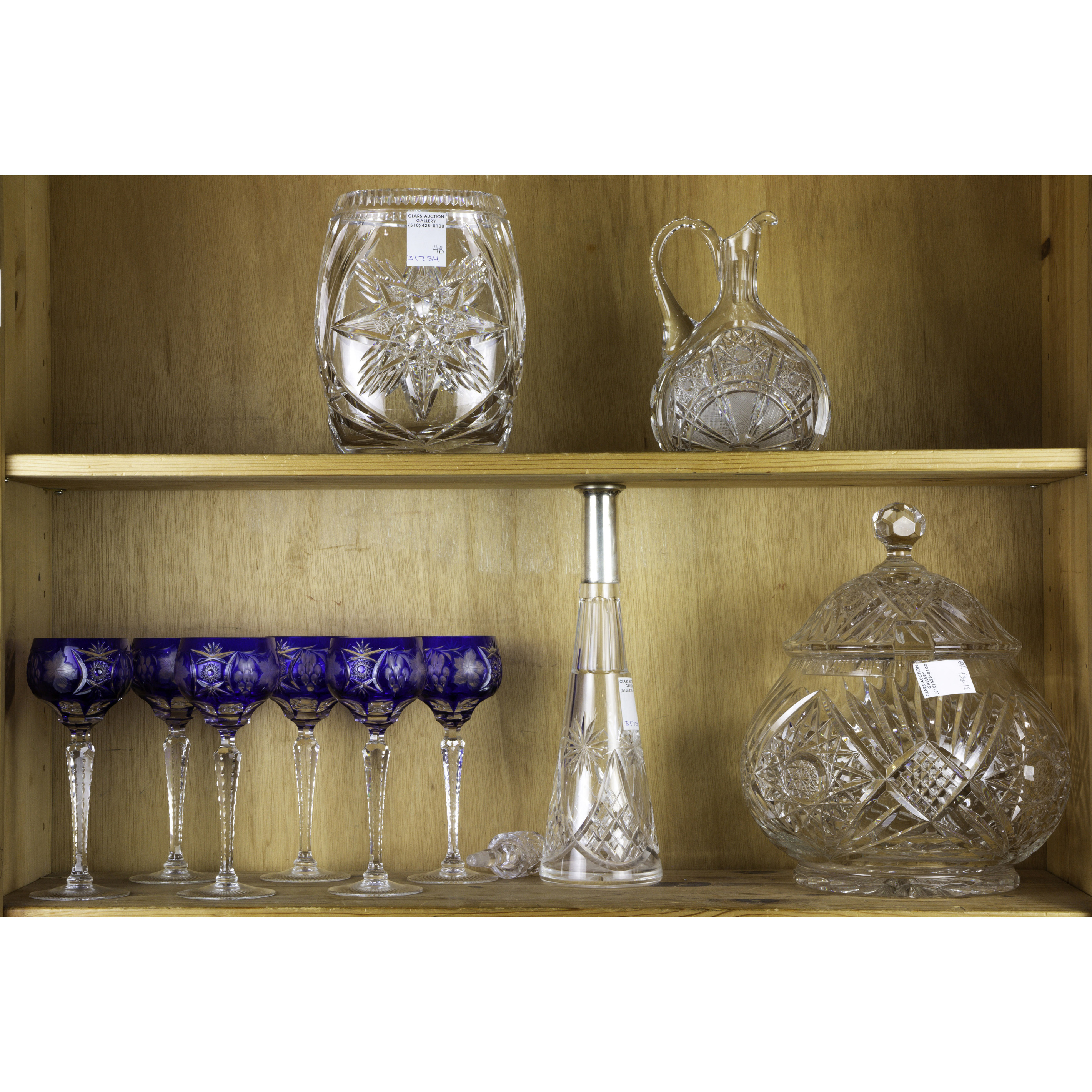 (LOT OF 10) TWO SHELVES OF CUT