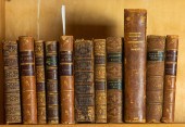 (LOT OF 11) ANTIQUE LEATHER BO