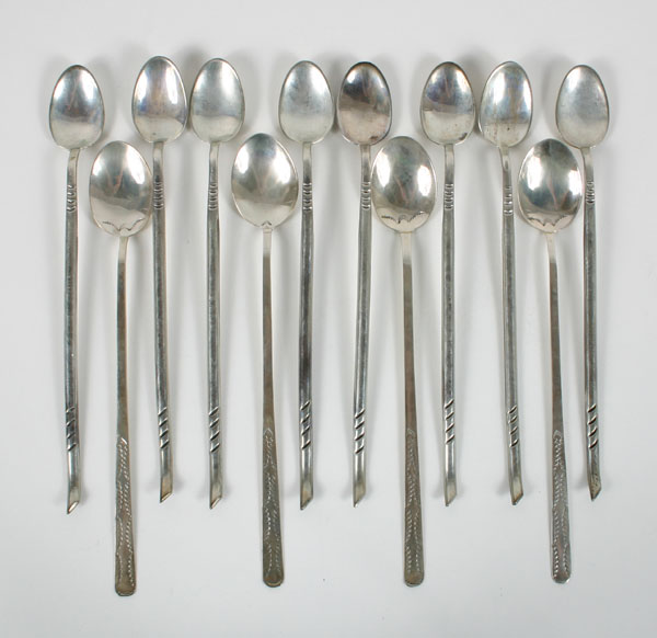 Lot of 12 ice tea spoons; Native