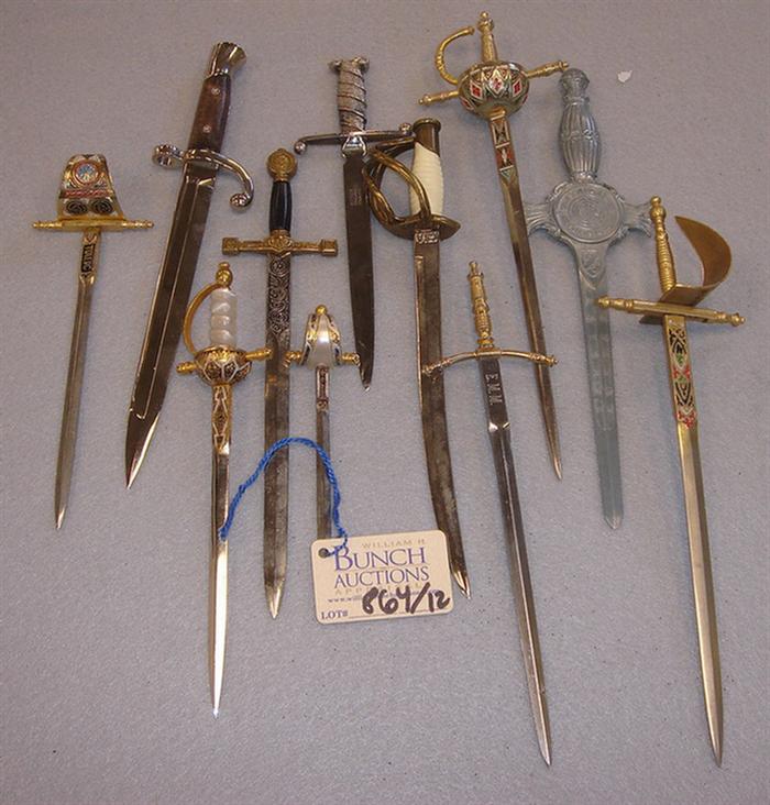 Lot of 12 vintage sword shaped