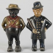 Lot of 2: Cast Iron Figural St