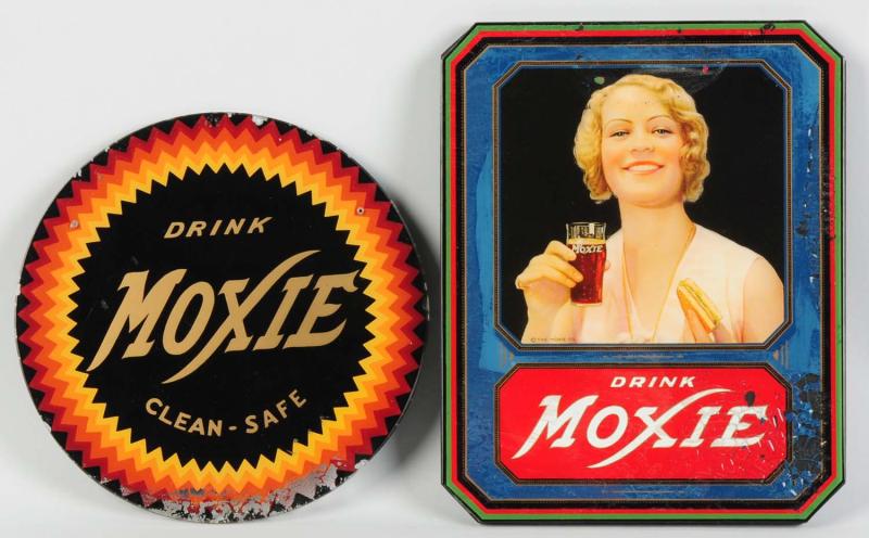 Lot of 2: Glass Moxie Signs.  Round