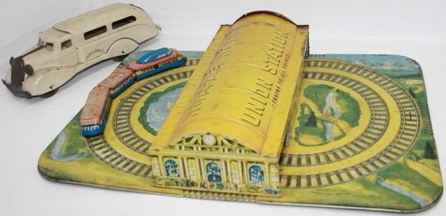 LOT OF 2 METAL TOYS, ONE PRESSED