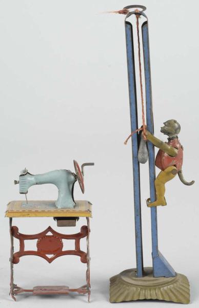 Lot of 2: Tin Litho Penny Toys. 