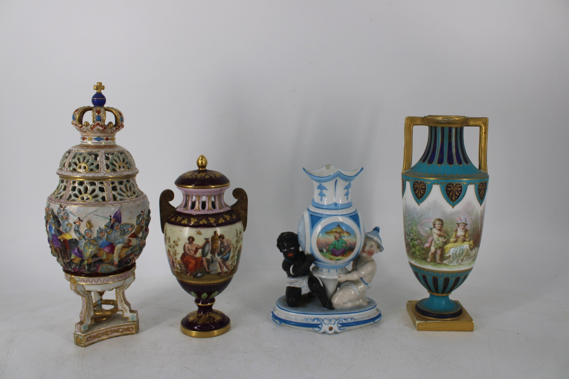 LOT OF 3 PORCELAIN URNS AND A VASE.