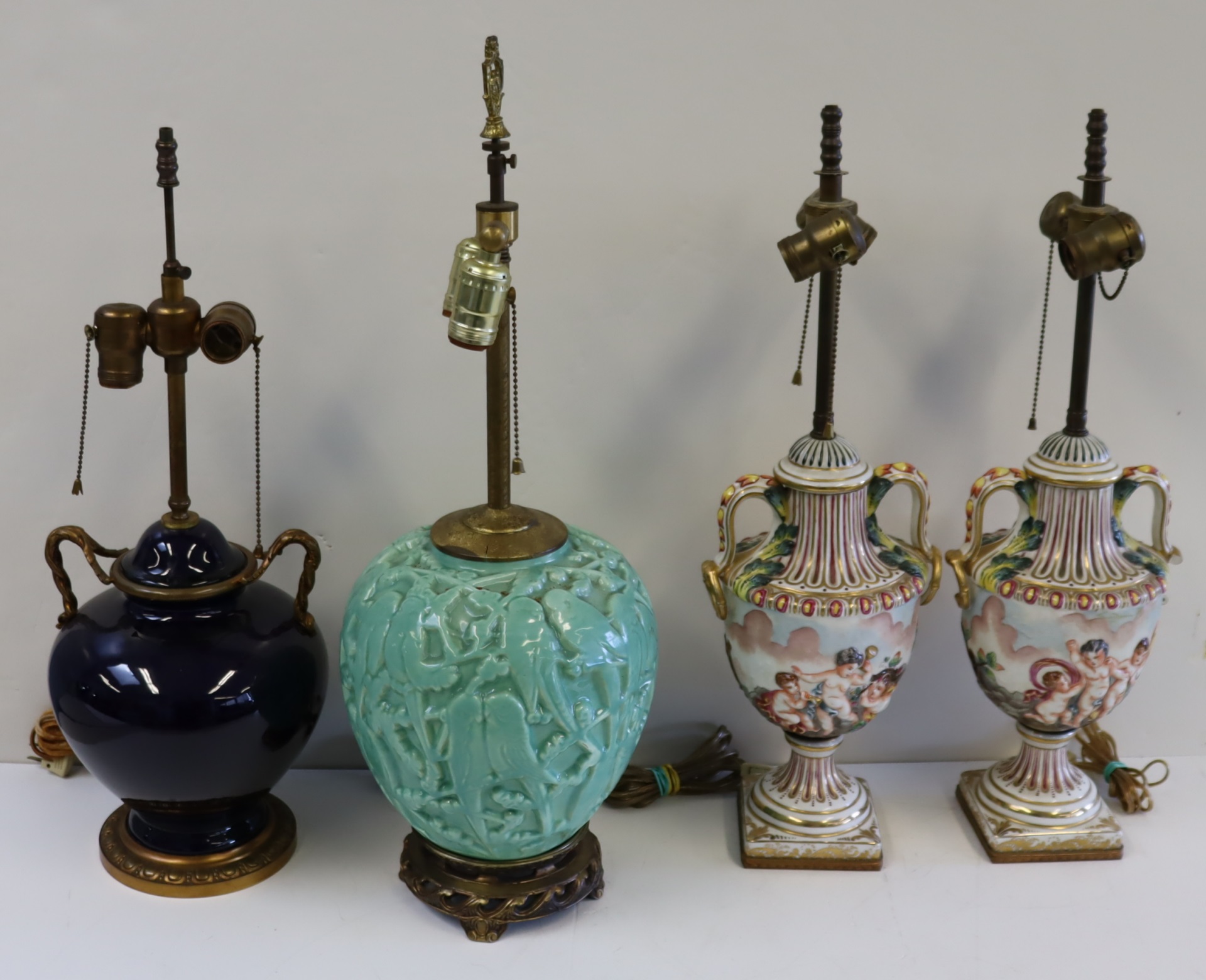 LOT OF 4 ANTIQUE LAMPS. To
