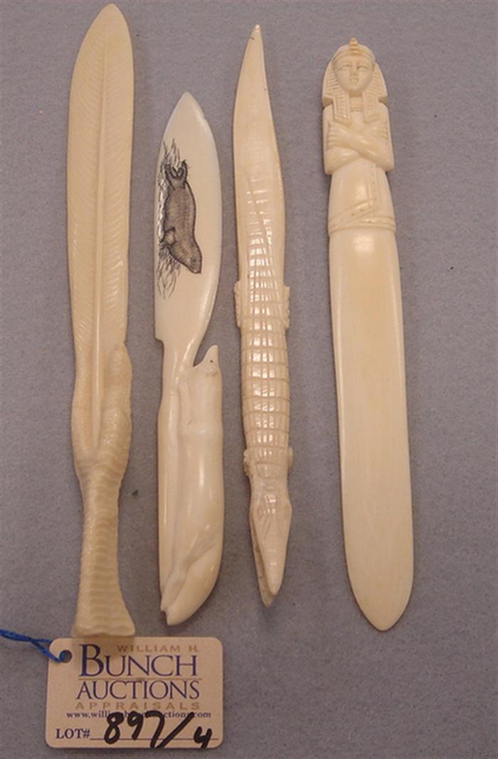 Lot of 4 vintage letter openers. 