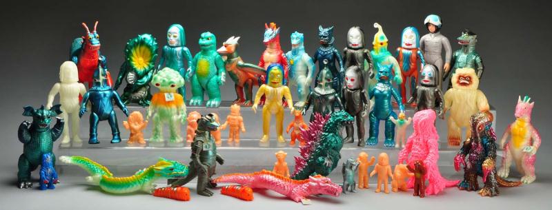 Lot of 46: Vinyl Figures. 