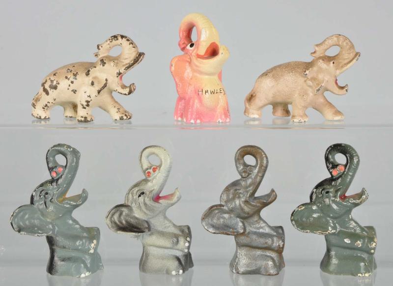 Lot of 7: Cast Iron Elephant Bottle