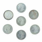 (LOT OF 7) MORGAN SILVER DOLLA