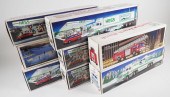 LOT OF 8 VINTAGE HESS TRUCKSLo