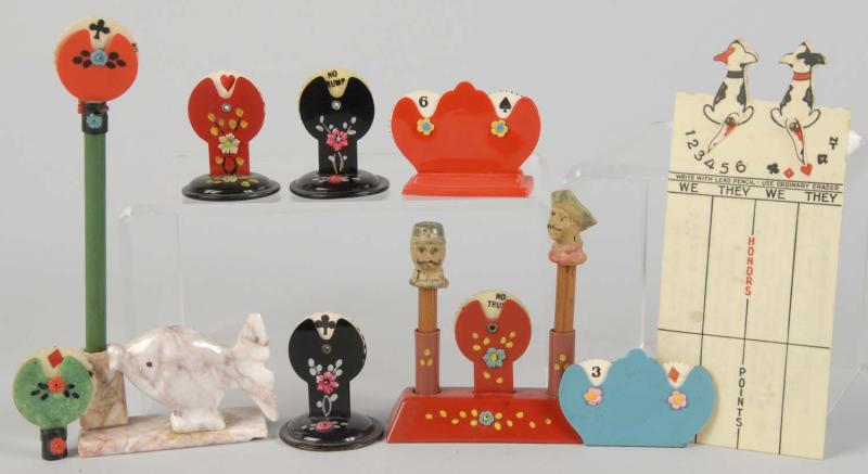 Lot of 9: Celluloid & Plastic Trump