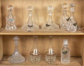(LOT OF 9) CUT GLASS DECANTERS
