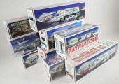 LOT OF 9 VINTAGE HESS TRUCKSLo