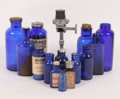 Lot of cobalt pharmacy bottles
