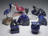 Lot of eight carved colored st