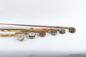LOT OF FISHING POLES AND FLY R