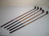 Lot of five assorted wood shaf