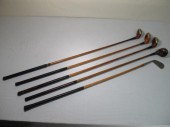 Lot of five assorted wood shaf