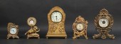 LOT OF FIVE GILDED METAL CLOCK