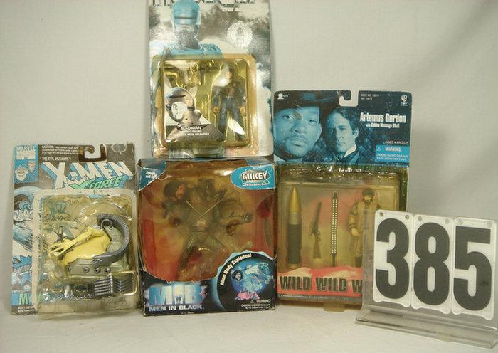 Lot of four action figures moc,