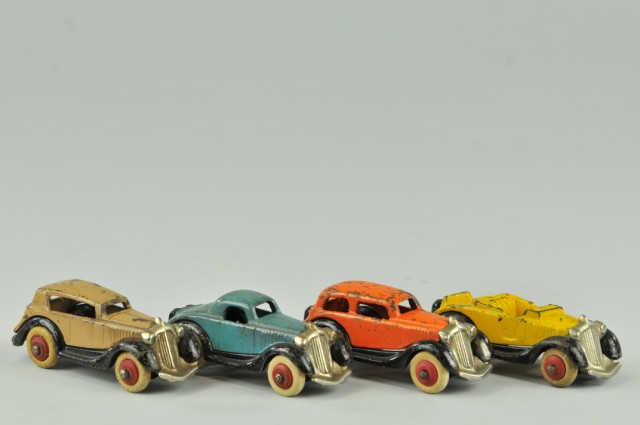 LOT OF FOUR AUTOS Cast iron painted