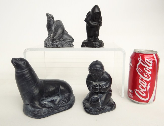 Lot of four Inuit sculptures.