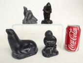 Lot of four Inuit sculptures.