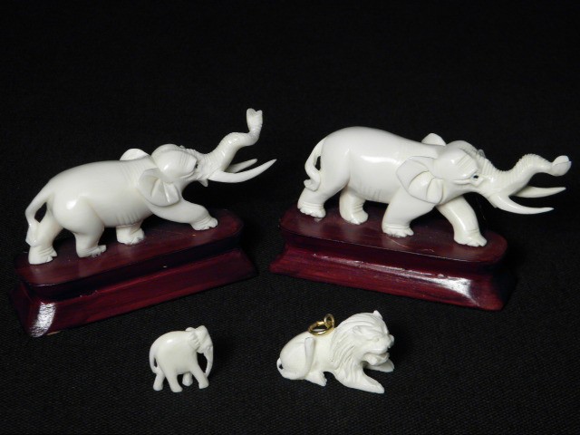 Lot of four miniature carved