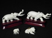 Lot of four miniature carved i