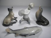 Lot of four porcelain figurine