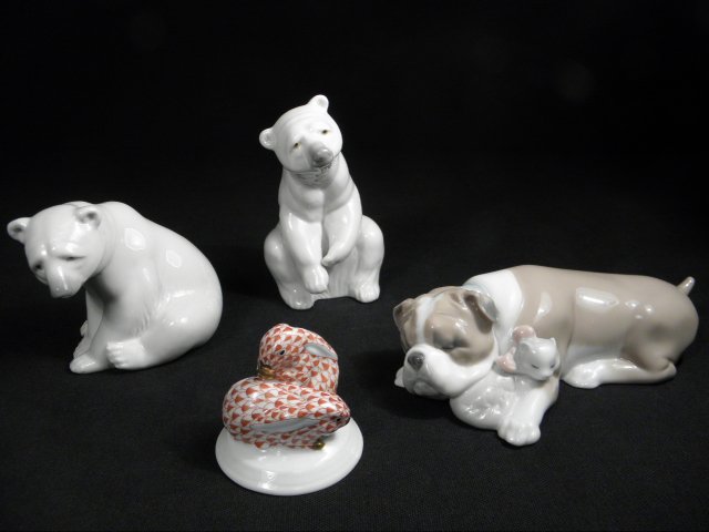Lot of four porcelain figurines.