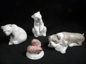 Lot of four porcelain figurine