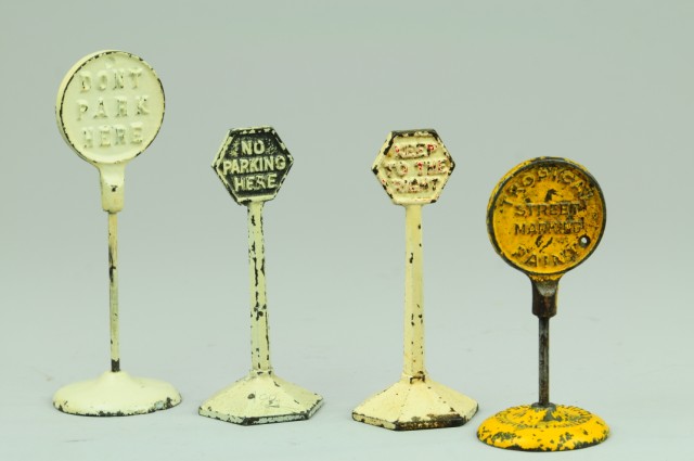 LOT OF FOUR ROAD SIGNS Cast iron