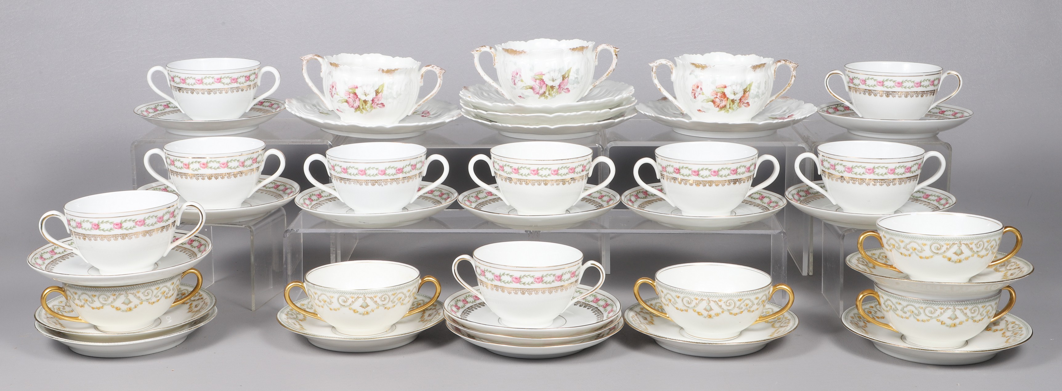 Lot of porcelain cream soup bowls &