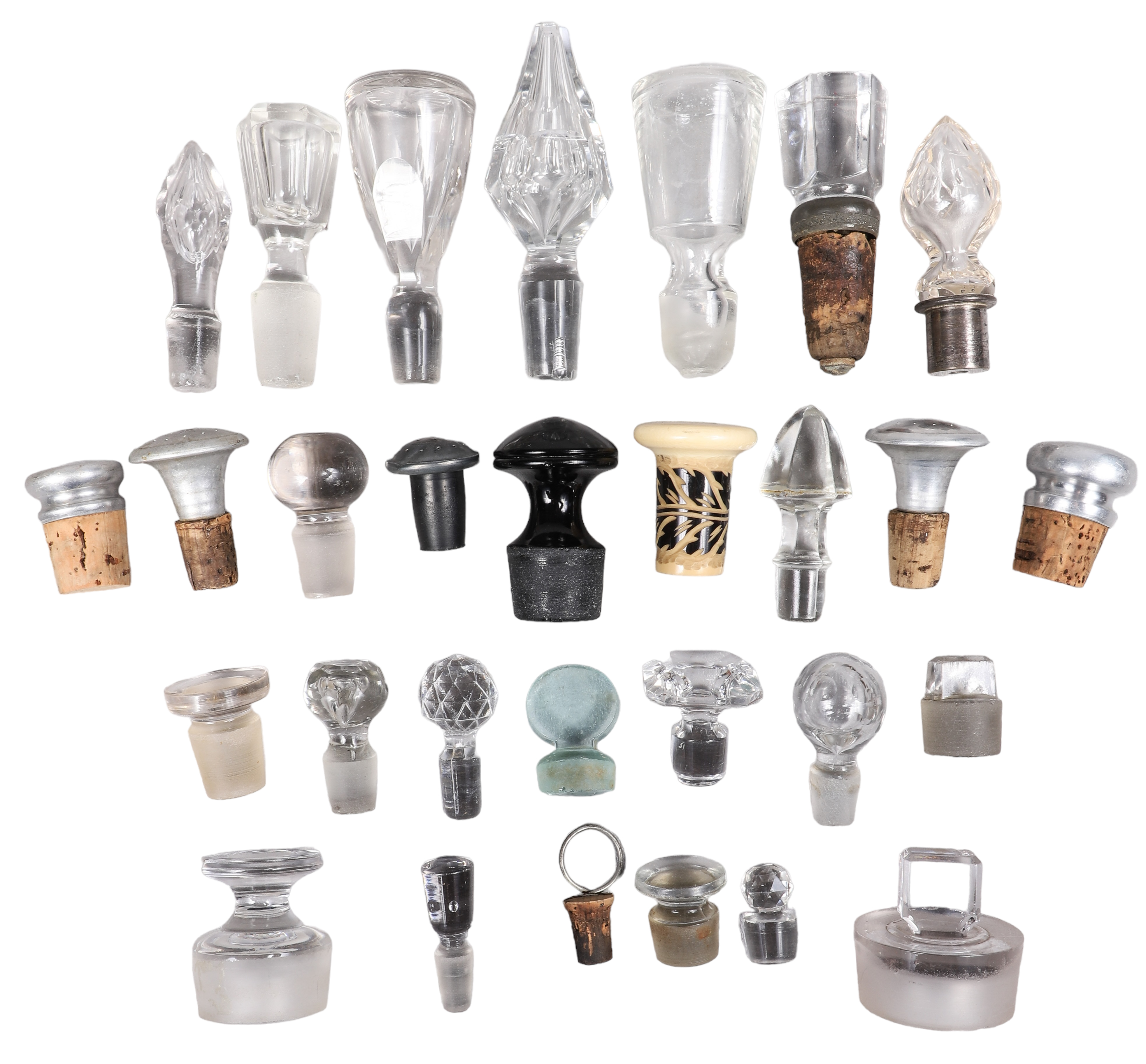 Lot of stoppers, mostly glass,