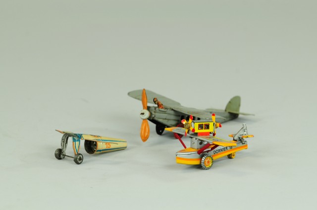 LOT OF THREE AIRPLANE PENNY TOYS