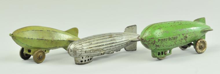 LOT OF THREE CAST IRON BLIMPS