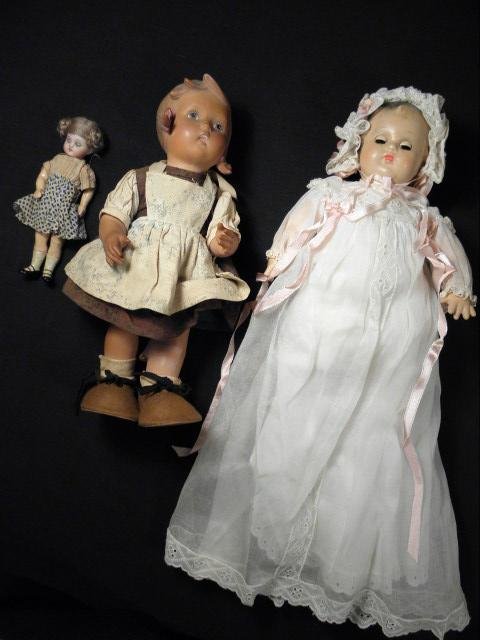 Lot of three early dolls.