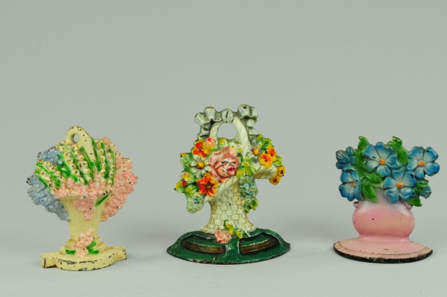 LOT OF THREE FLORAL BOOKENDS