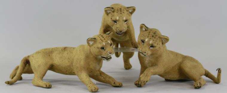 LOT OF THREE PAPIER M?CH? LION CUBS